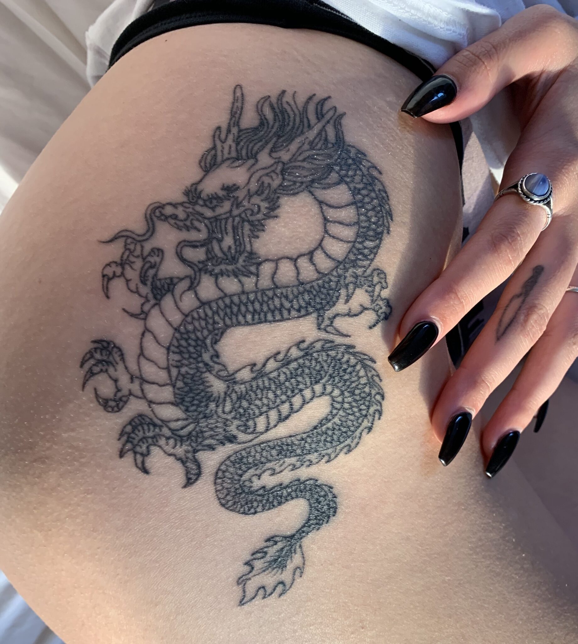 Fierce and powerful dragon tattoo images - Body Tattoo Art