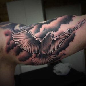 A Flying Dove Tattoo is a Symbol of Love and Devotion - Body Tattoo Art
